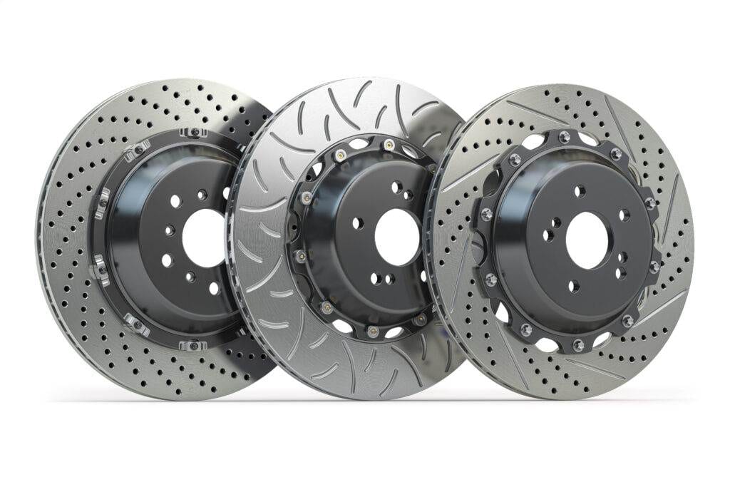 Three brake rotors stood up