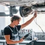 a man working on a car