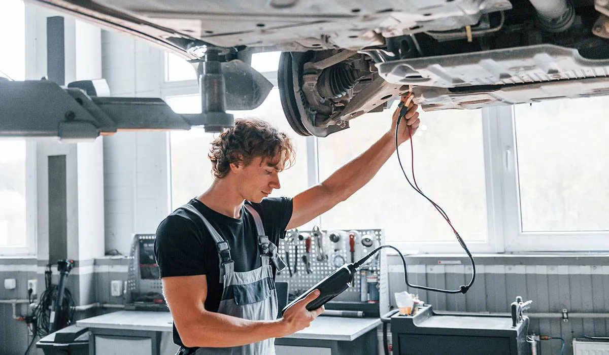 a man working on a car